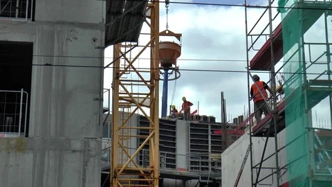 Construction Site with Crane and Workmen on Scaffolding Stock Footage 78222647