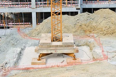 Construction site with crane base and excavated soil Stock Photos