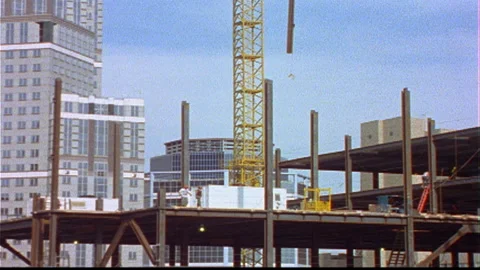 Construction site crane delivers vertical beam timelapse Stock Footage 145782523
