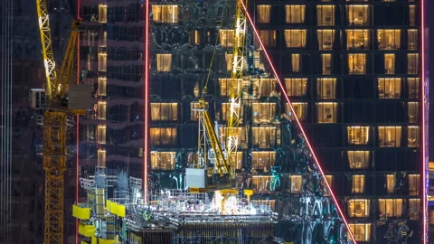 Construction site with crane at JBR night timelapse. Building of skyscrapers. Video stock 101919978