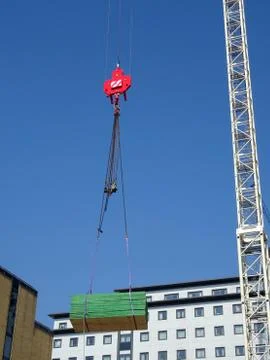 Construction Site Crane Lifting A Load Stock Photos