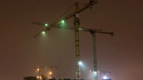 Construction site with crane night time lapse. Building of skyscrapers. Stock Footage 118692873
