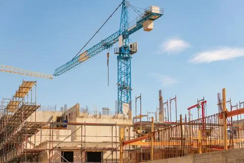 A construction site with a crane Stock Photos