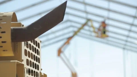 Construction site crane with workers Stock Footage 77048283