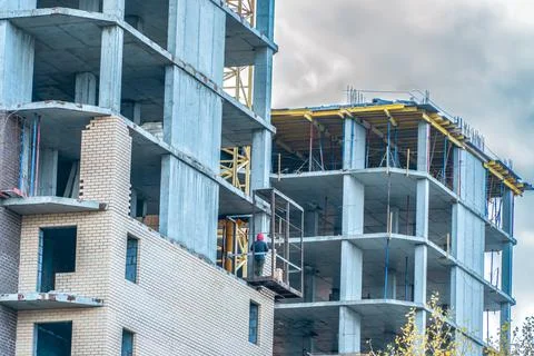 Construction site with a crane.Long-term construction.A new building under co Stock Photos