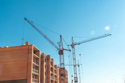 Construction site with a crane.Long-term construction.A new building under .. Stock Photos
