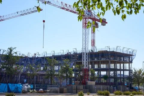 Construction site with cranes and building framework in Madrid, Spain Fotos Stock