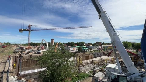 Construction site with cranes and other construction equipment Stock Footage 247625340