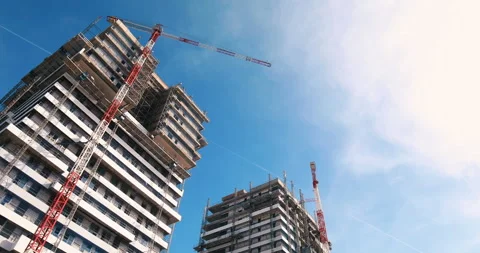 Construction Site: Cranes and Workers Transforming the Skyline, 4k Stock Footage 243191338
