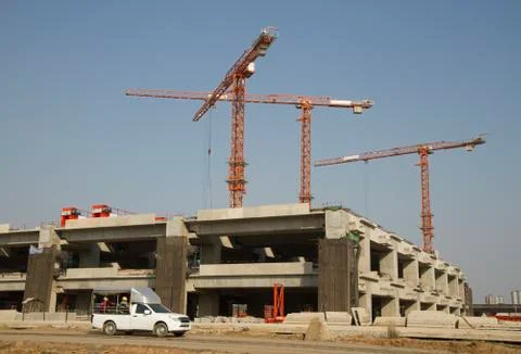 Construction site with cranes with blue sky background Stock-Fotos