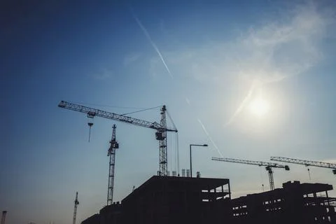 Construction site with cranes Stock Photos