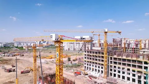 Construction site with cranes Stock Photos
