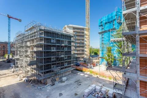 Construction site with cranes Stock Photos