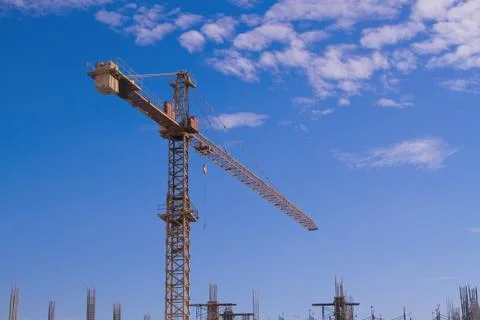 Construction site with cranes on sky background Stock Photos