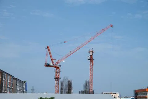 Construction site with cranes on sky background Stock Photos
