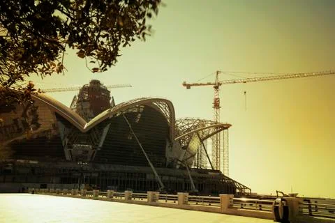 Construction site with cranes on sky background Stock Photos