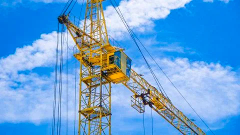 Construction site with cranes on sky background. Construction of buildings Stock Photos