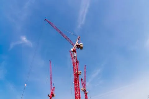 Construction site with cranes on sky background Stock Photos