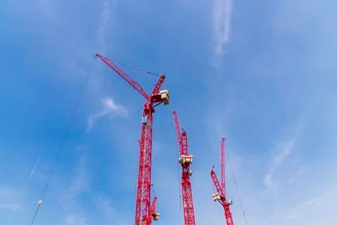 Construction site with cranes on sky background Stock Photos