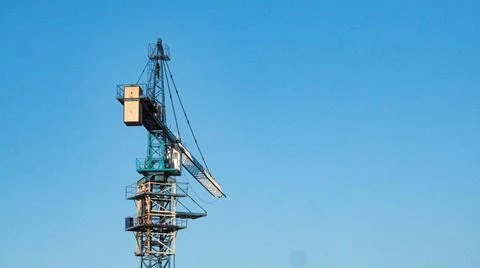 Construction site with cranes on sky background Stock Photos