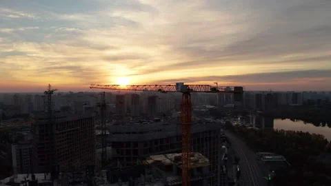 Construction site with cranes at sunset. Construction of an apartment building. Stock Footage 205198065