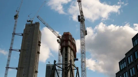 Construction site cranes timelapse Stock Footage 75656749