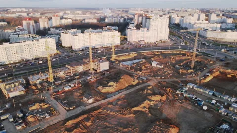 Construction site at dawn. Claimed multi-storey houses are visible. Construction Stock Footage 152979965