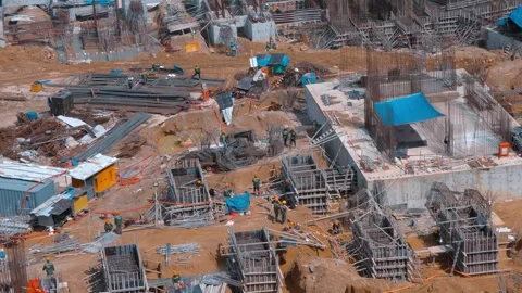 Construction site with dense rebar cages, formwork systems and support structure Stock Footage 340462285