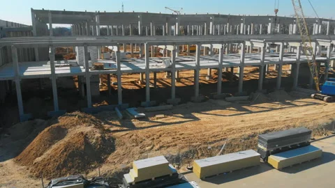 Construction site development. Aerial drone shot of large metallic and marble Stock Footage 163255100