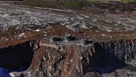 Construction site with drilling equipment at a rocky location 動画素材 337940359