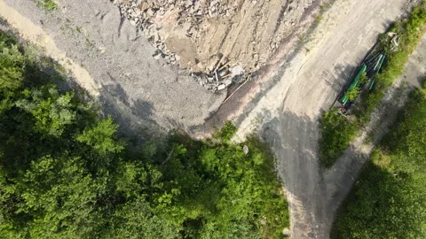 Construction site drone fly over with trailers and trucks Stock Footage 132010297