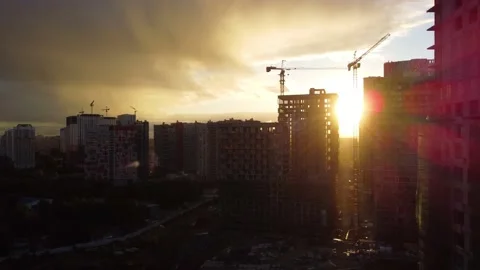 Construction site during the golden hour at sunset Stock Footage 239048339