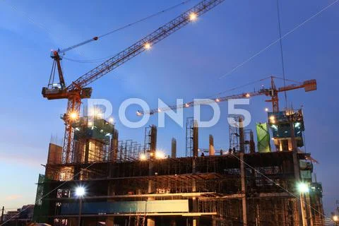 Construction site at dusk Stock Photos