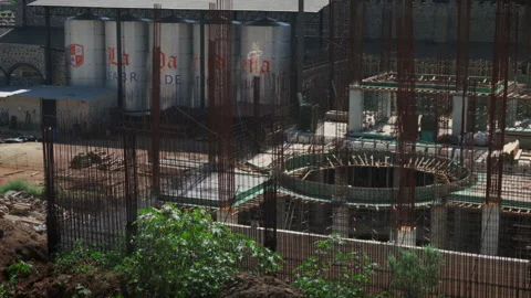 Construction site at El Castillo distillery with industrial tequila tanks Видео 346658999