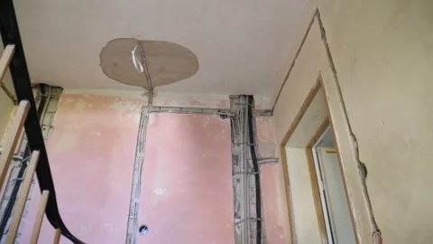 Construction site - electrical installation in staircase Видео 248233779