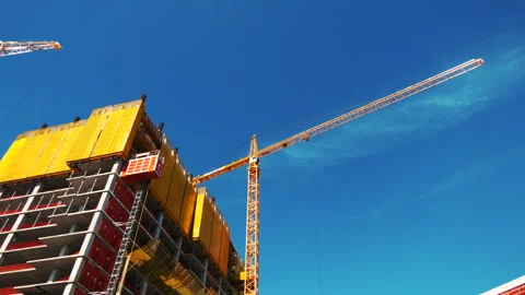 Construction Site Elevator with Crane in Background Stock-Footage 240511454