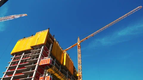 Construction Site Elevator with Crane in Background Stock Footage 240512279