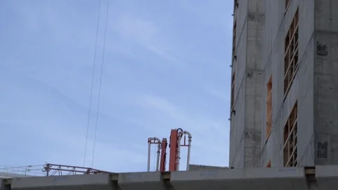 Construction Site Elevator Towers with wooden structures tilt-up Stock Footage 81453017