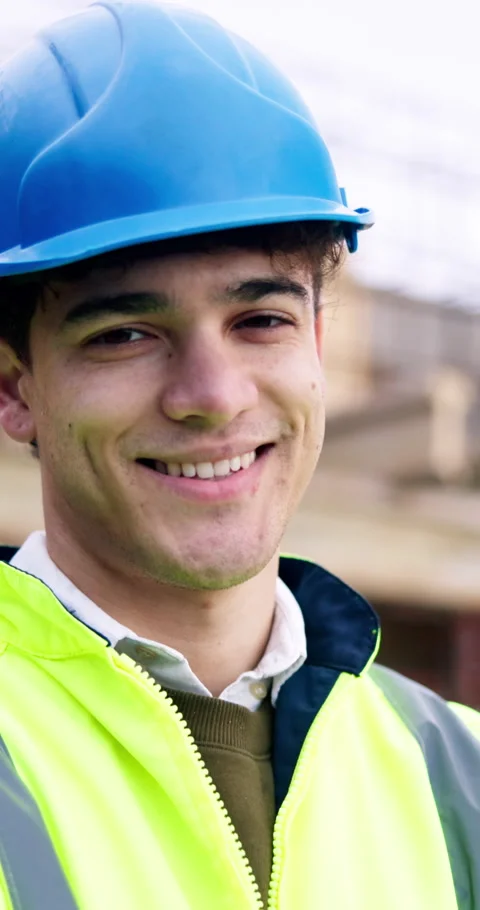 Construction site, engineer and man with smile outdoor for building development Stock Footage 340872634
