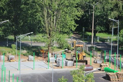 Construction site with equipment on trees background 库存照片