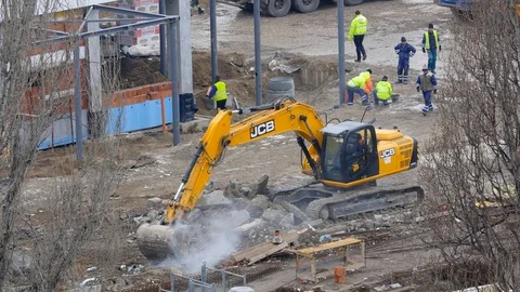 Construction Site Excavator Destroying With Workers Around Stock Footage 87183185