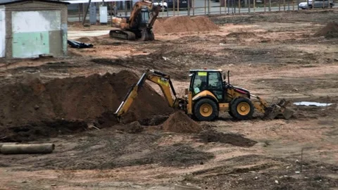 Construction site, excavator loader working on the construction site Stock Footage 241941023