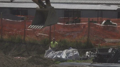Construction Site, Excavator Moving Heavy Equipment Video stock 75040740