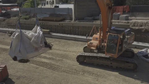 Construction Site, Excavator Moving Heavy Equipment Stock Footage 75040928