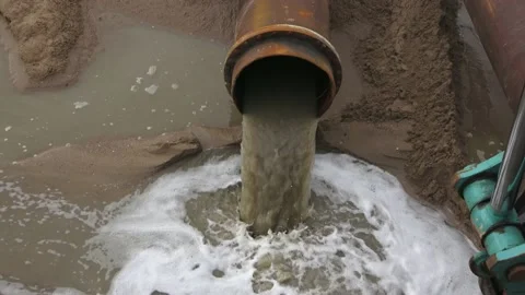 Construction Site Excavator Next To  Water Flowing Out Of A Pipe Stock Footage 150384091