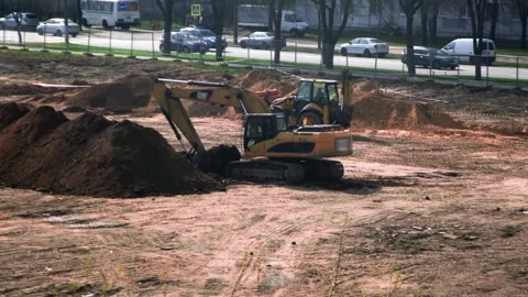 Construction site, excavator working on a construction site Stock Footage 241940995