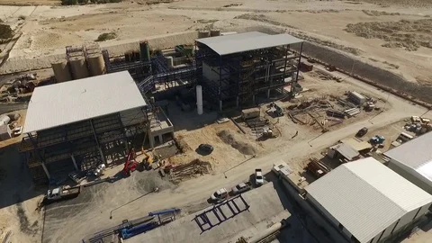 Construction site of a factory at the Negev, Israel, 1080p drone footage Stock Footage