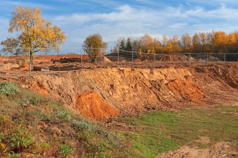 Construction site in fall on sunny day in countryside. Beginning of construction Stock Photos
