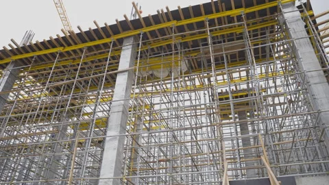 Construction site features extensive scaffolding system Stock-Footage 303148169