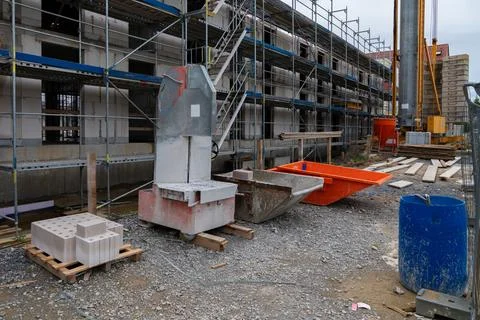Construction site features various equipment and materials Stock Photos